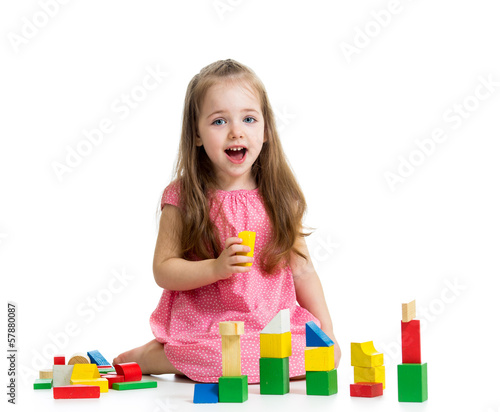 kid girl playing with block...