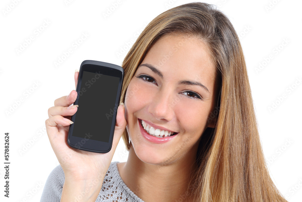 Cute girl showing a blank smart phone screen isolated Cute girl showing a blank smart phone screen isolated