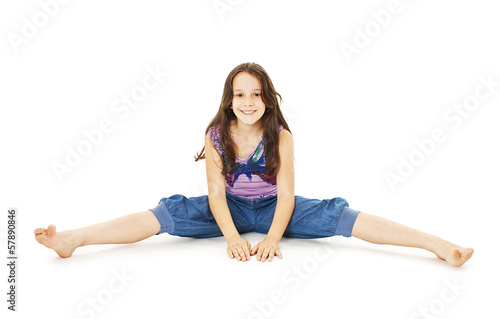 Pretty little girl sitting on the floor in jeans © Jelena Ivanovic