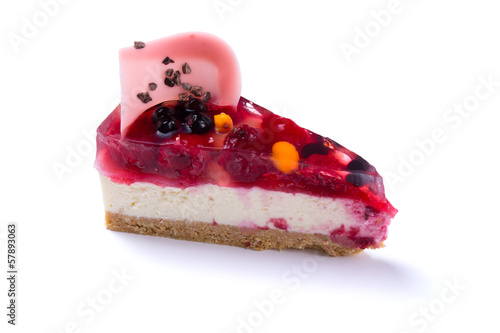 Billede på lærred Delicious fruit cake isolated on white background