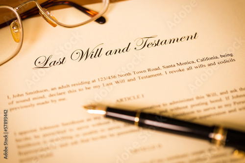 Last will and testament with pen and glasses concept for legal d