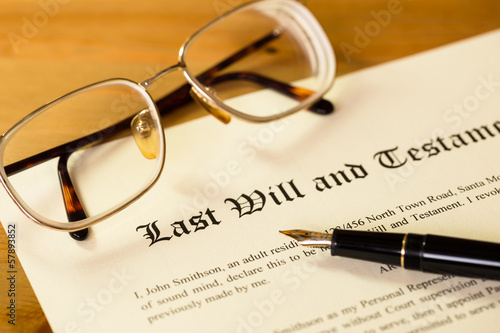 Last will and testament with pen and glasses concept for legal d