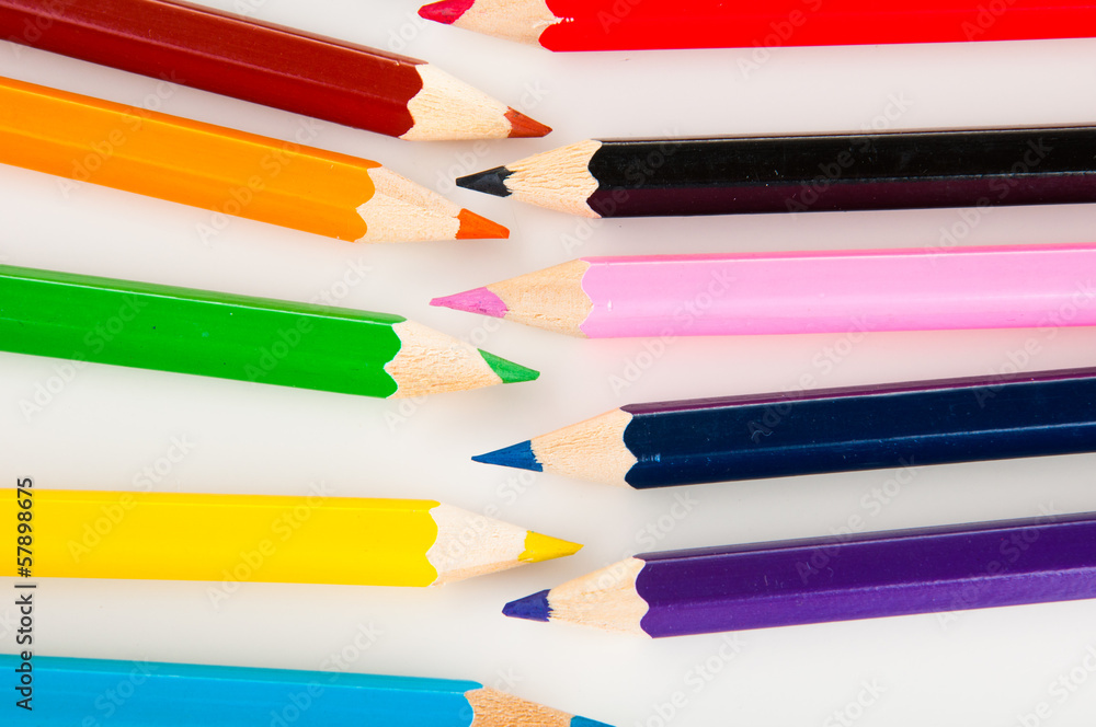 Fototapeta premium Wooden color pencils on white background