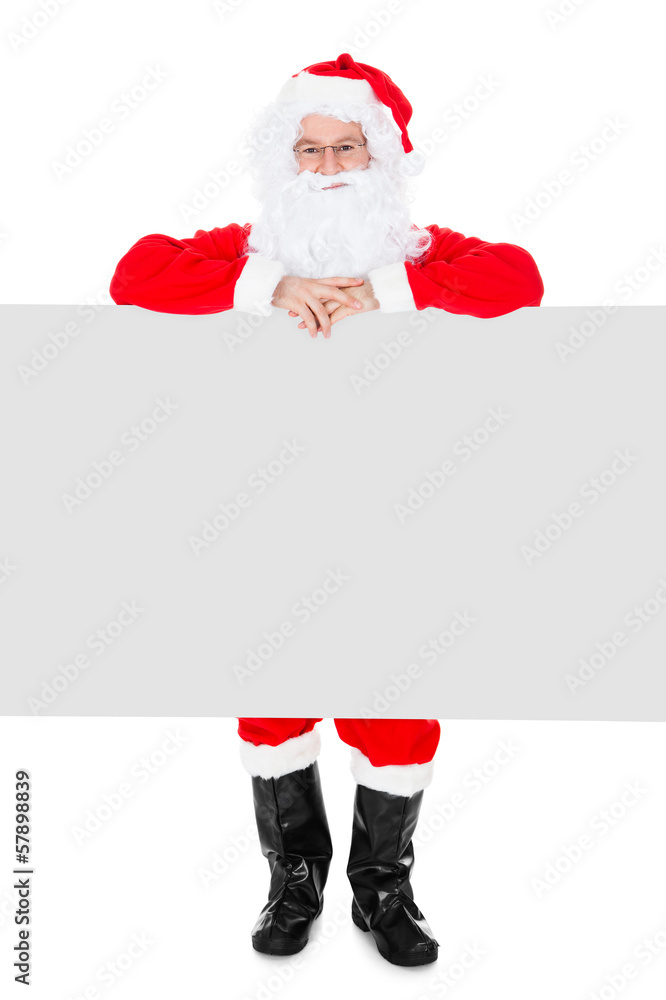 Portrait of a santa holding blank placard Portrait of a santa holding blank placard