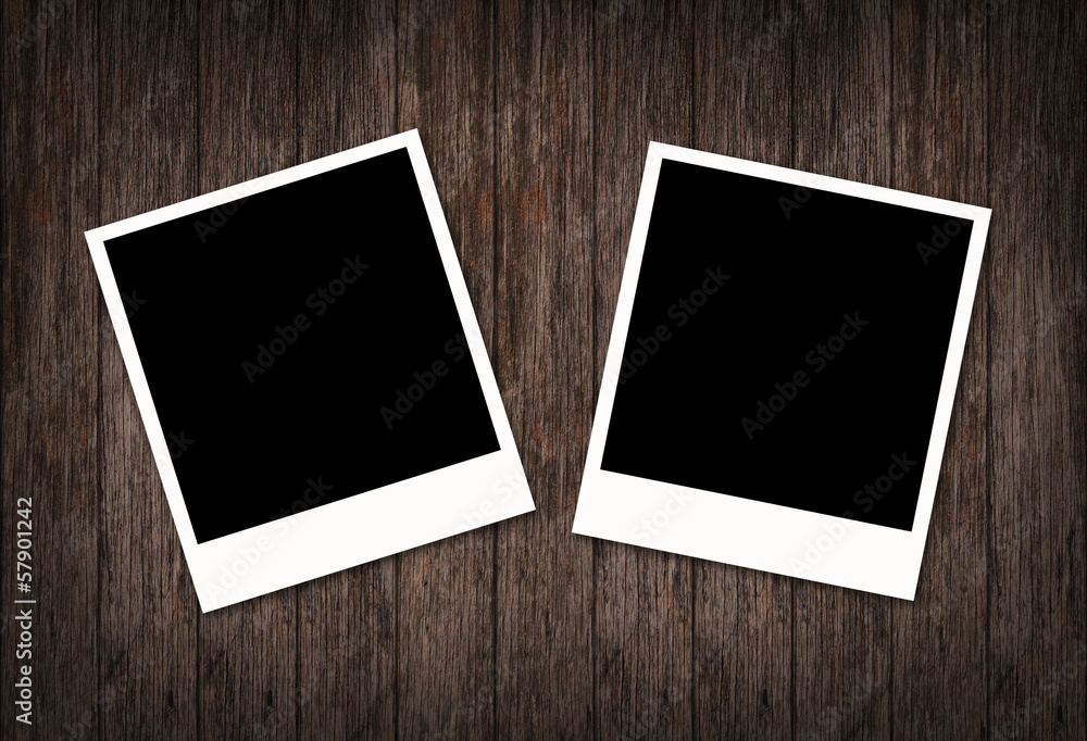 old pictures or blank photo on a wooden background old pictures or blank photo on a wooden background
