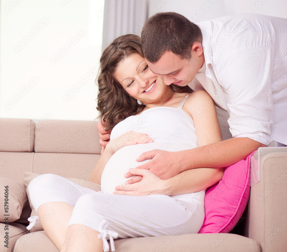 Beautiful Pregnant Woman and Her Husband Expecting Baby