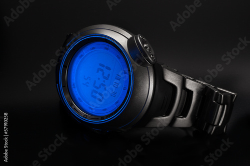 Wristwatch on a black background photo