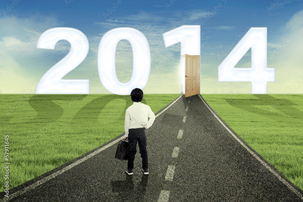 A boy looking into the future in 2014 A boy looking into the future in 2014