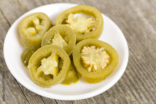 Jalapenos - Bowl of pickled sliced green jalapeno peppers