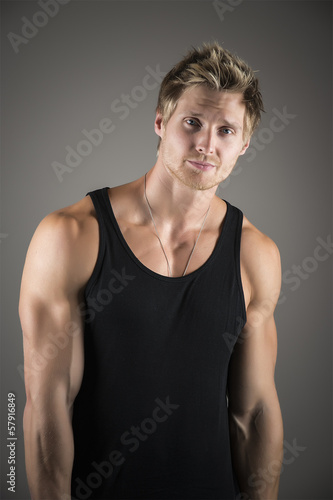 Blond handsome man in black shirt