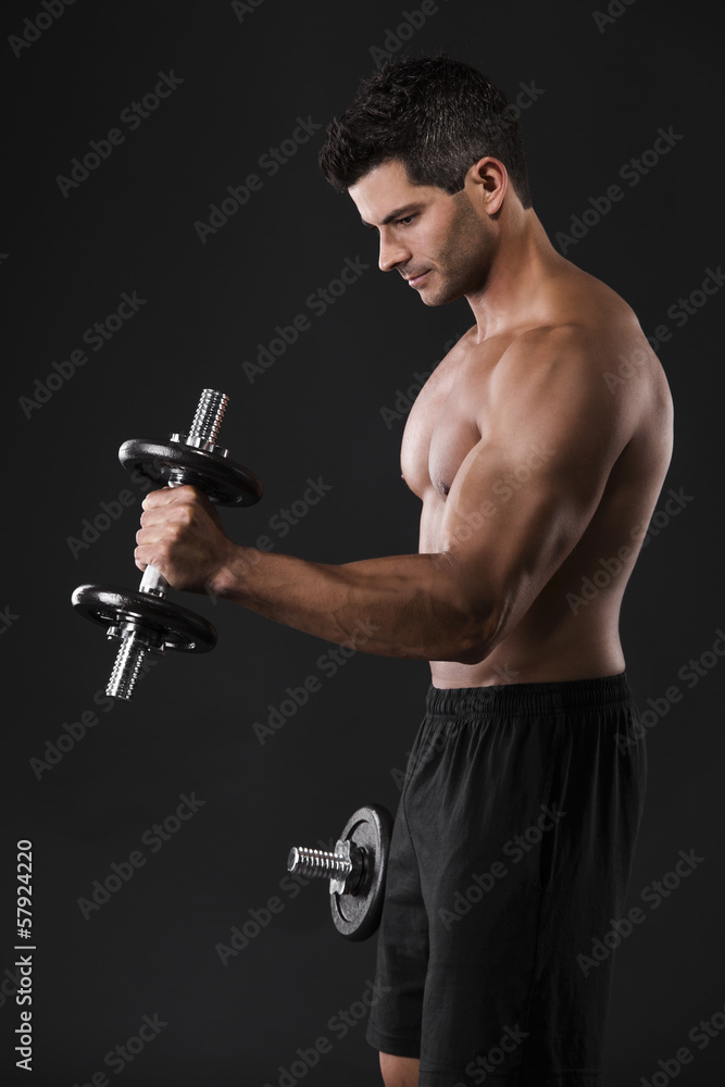 Muscular man lifting weights Muscular man lifting weights