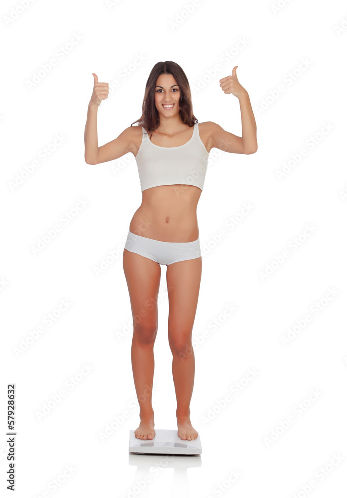 Happy woman saying Ok on a scale Happy woman saying Ok on a scale