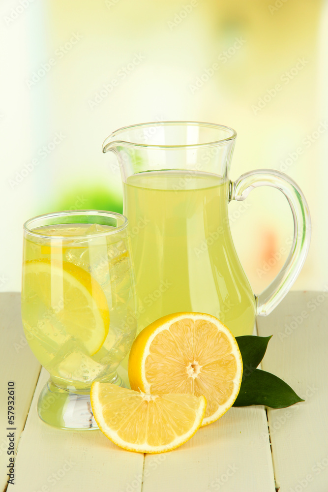Delicious lemonade on table on light background Delicious lemonade on table on light background