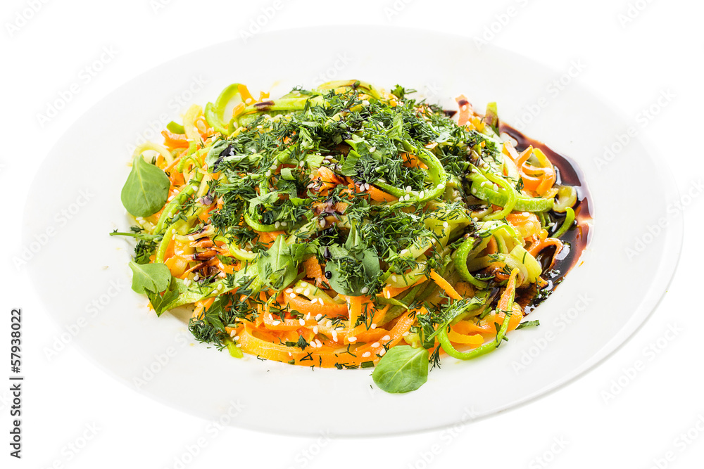 plate with mixed salad isolated on white