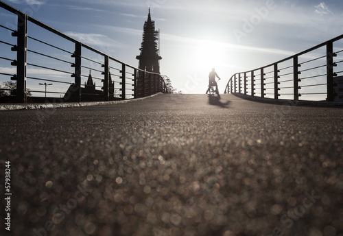 cyclist on bridge in Freiburg  Germany