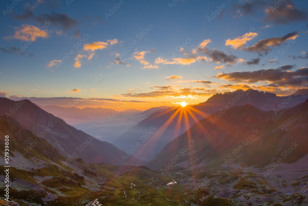beautiful sunrise over a mountain valley