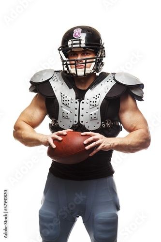 American football player wearing helmet and protective armour © Nejron Photo