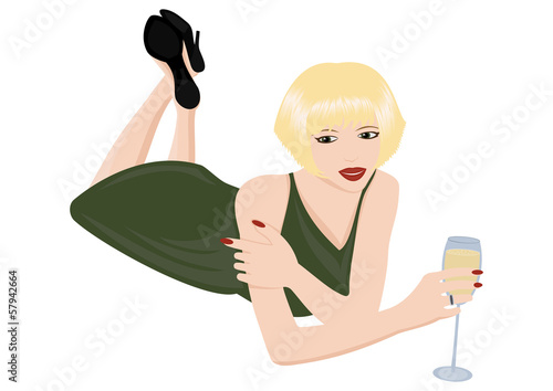 Woman in green dress with glass of sparkling wine