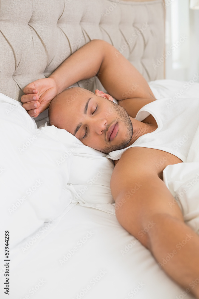 Young man sleeping in bed Young man sleeping in bed