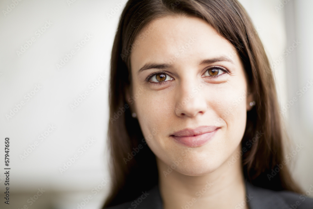 Portrait of smiling businesswoman, head and shoulders Portrait of smiling businesswoman, head and shoulders
