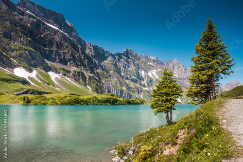 Fototapeta Naklejka Na Ścianę i Meble -  Hiking around Truebsee lake in Swiss Alps, Engelberg, Central Sw