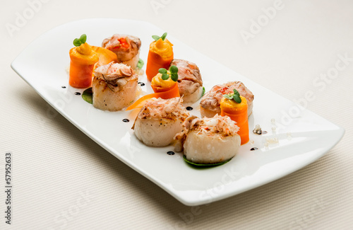 Delightful dish with fish fillet and carrot with pumpkin sauce