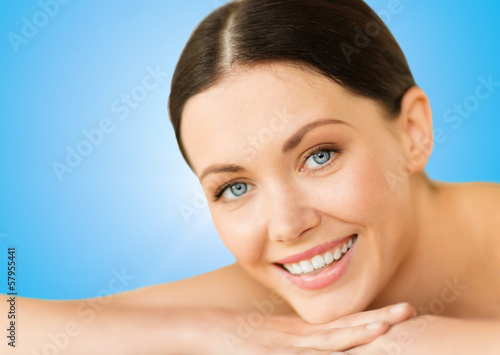 beautiful smiling woman in spa salon