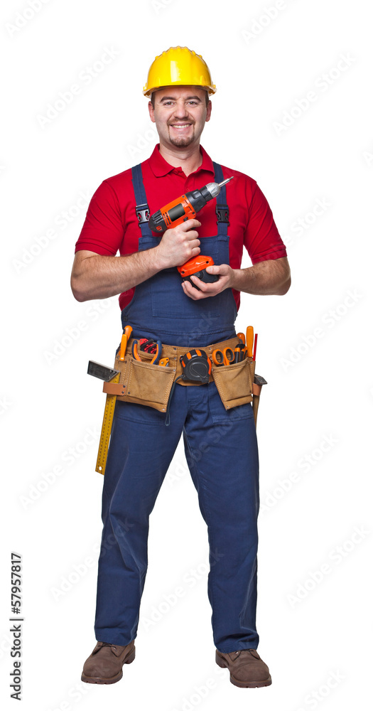 Smiling Caucasian worker standing with tool belt isolated on white Smiling Caucasian worker standing with tool belt isolated on white