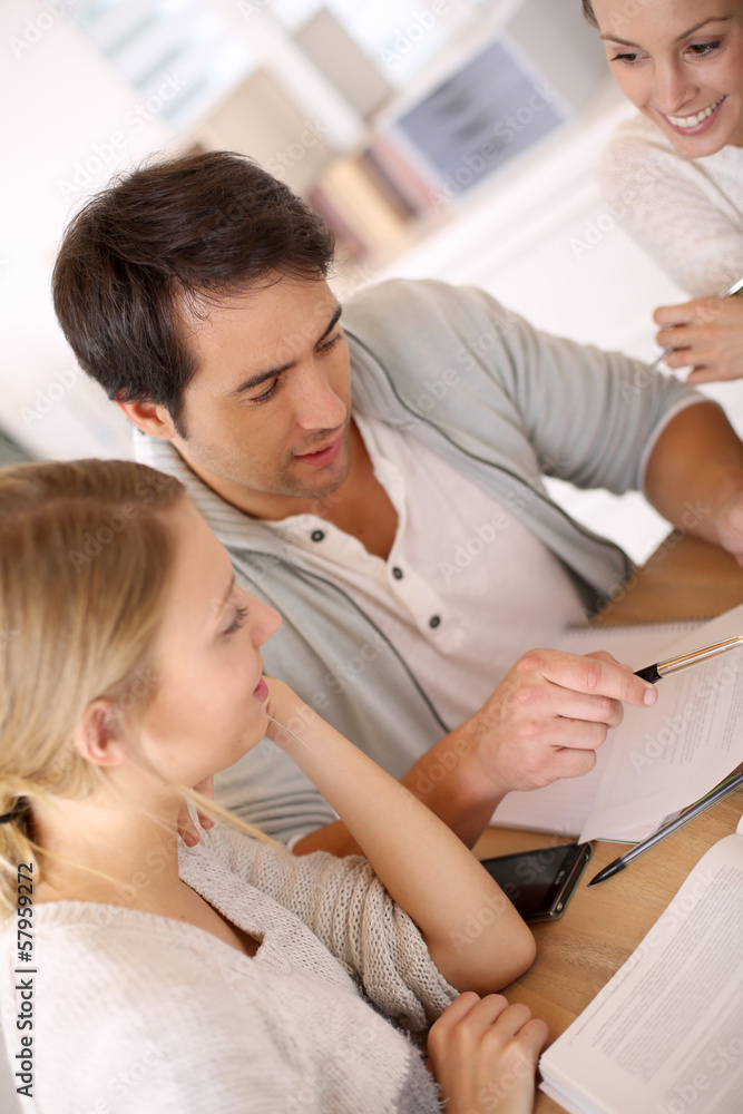 Group of business people in office working on project