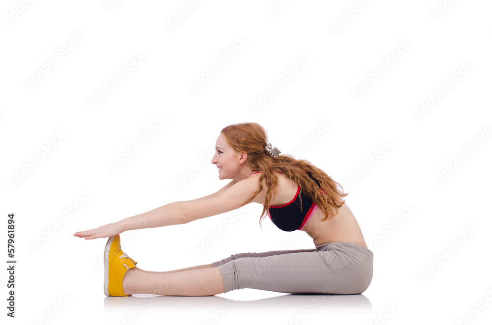 Young sporty woman doing exercises on white Young sporty woman doing exercises on white