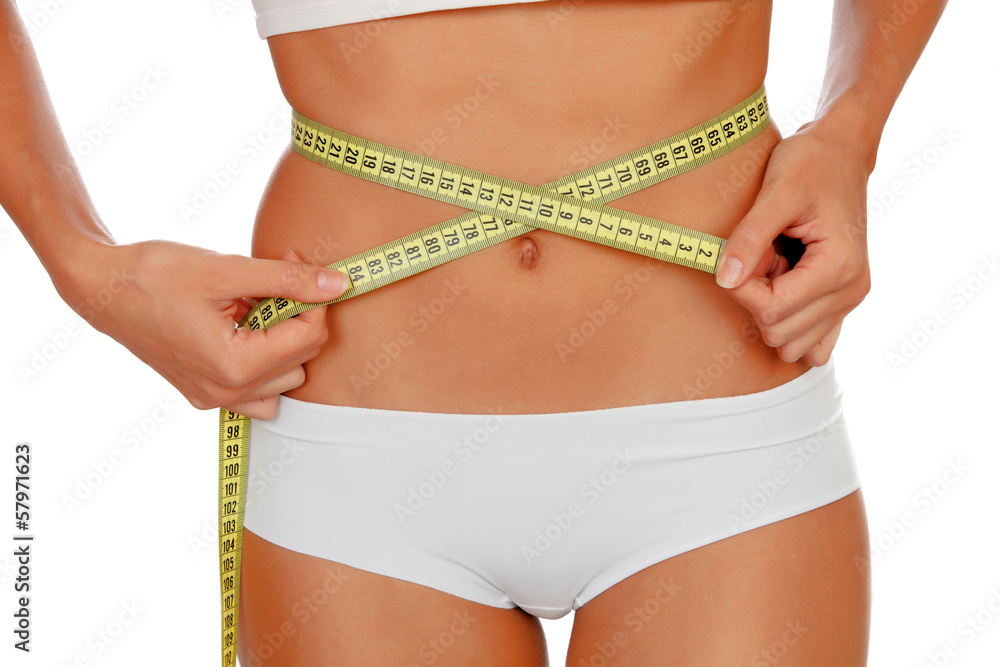 Girl in white underwear with a tape measure around her waist