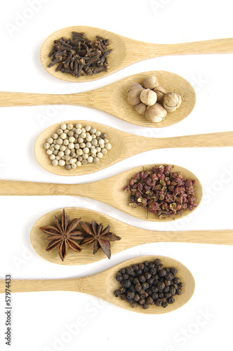 An angled view of spices in a row