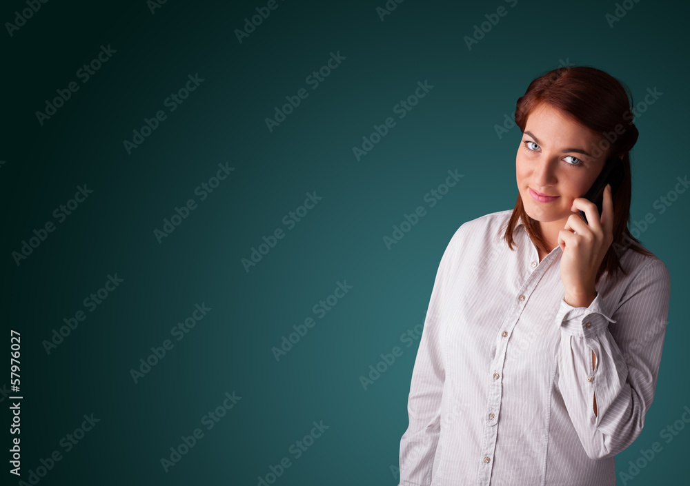 Young woman making phone call with copy space Young woman making phone call with copy space