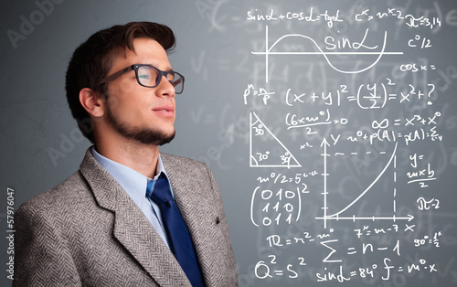Handsome school boy thinking about complex mathematical signs © ra2 studio