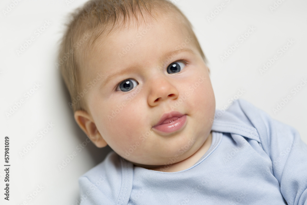 Close up portrait of adorable baby boy.