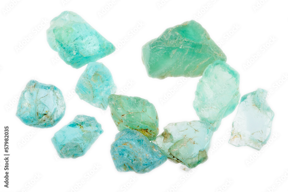 Rough pile of Apatite gemstones in a lovely blueish green color. Rough pile of Apatite gemstones in a lovely blueish green color.