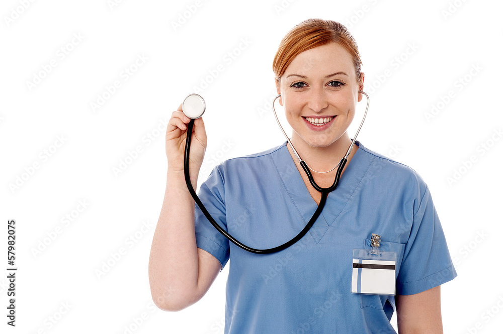 Female physician posing with stethoscope Female physician posing with stethoscope