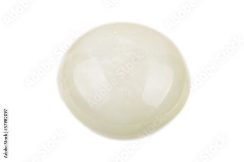 A lovely round cabochon cut Albite gemstone