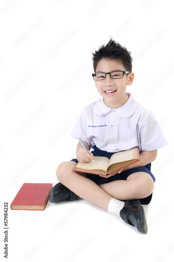 Asian child boy in student's uniform on isolated background Asian child boy in student's uniform on isolated background