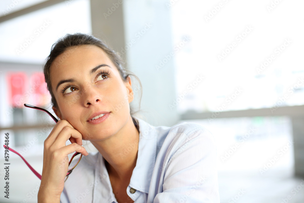 Young woman with thoughtful look Young woman with thoughtful look