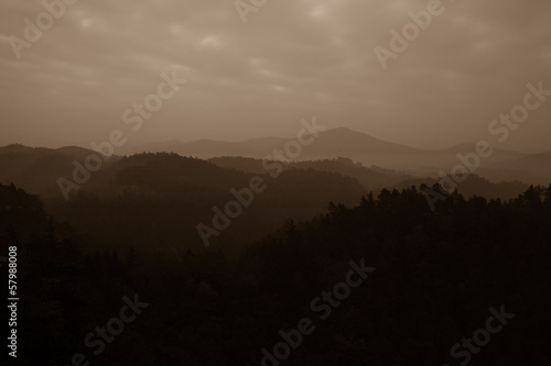 Wallpaper Mural Trees and mountain range against cloudscape Torontodigital.ca