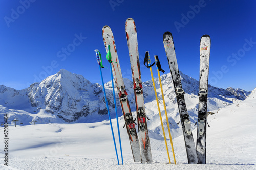 Ski, winter season - ski equipments on ski run