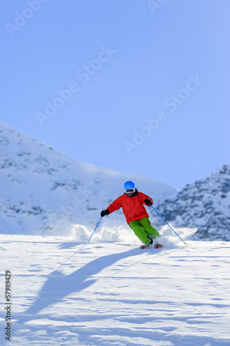 Skiing, Skier, Freeride in fresh powder snow 