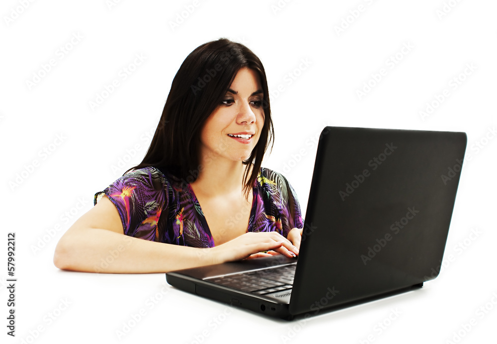 Beautiful and happy girl with a laptop on white background Beautiful and happy girl with a laptop on white background