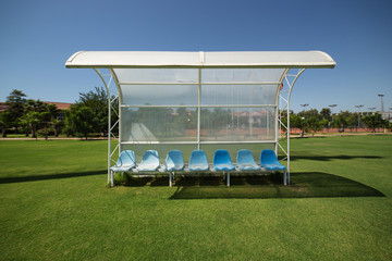 Papier peint photo Football Banc de touche dans stade sportif  © Maksim Kostenko