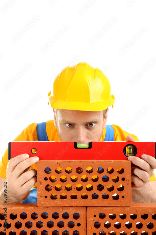 Portrait of young builder isolated on white Portrait of young builder isolated on white