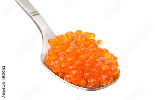 Spoon with red caviar isolated