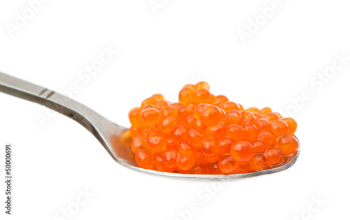 Spoon with red caviar isolated