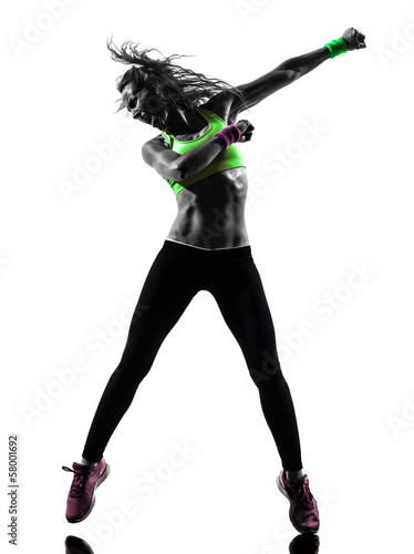 woman exercising fitness zumba dancing silhouette #58001692