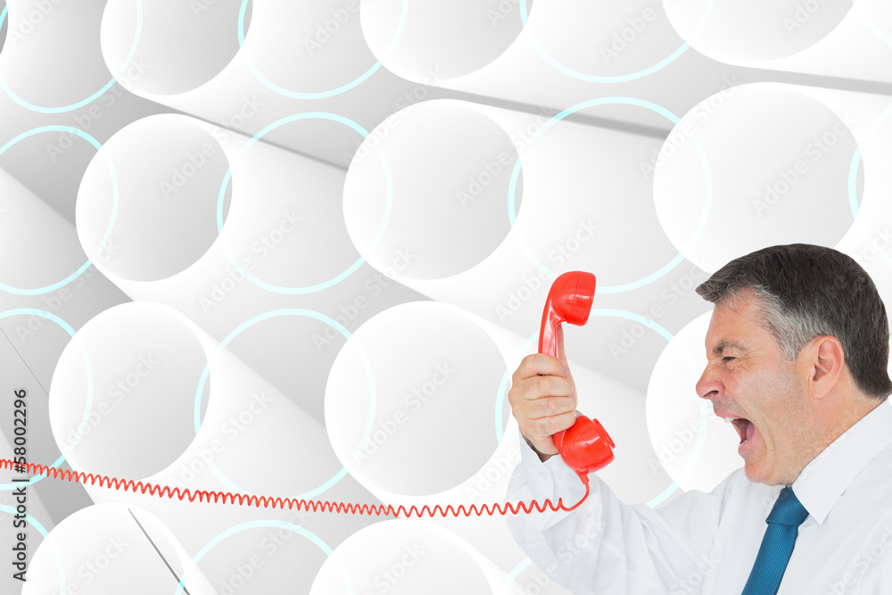 Composite image of businessman screaming directly into the hands Composite image of businessman screaming directly into the hands